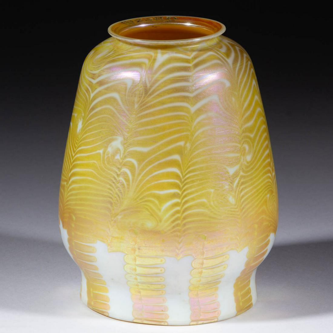 QUEZAL KING TUT AND ZIPPER IRIDESCENT ART GLASS LAMP: QUEZAL KING TUT AND ZIPPER IRIDESCENT ART GLASS LAMP SHADE, opal with golden decoration, signed "QUEZAL" to the interior of the fitter. Quezal Art Glass and Decorating Company. First quarter 20th cent