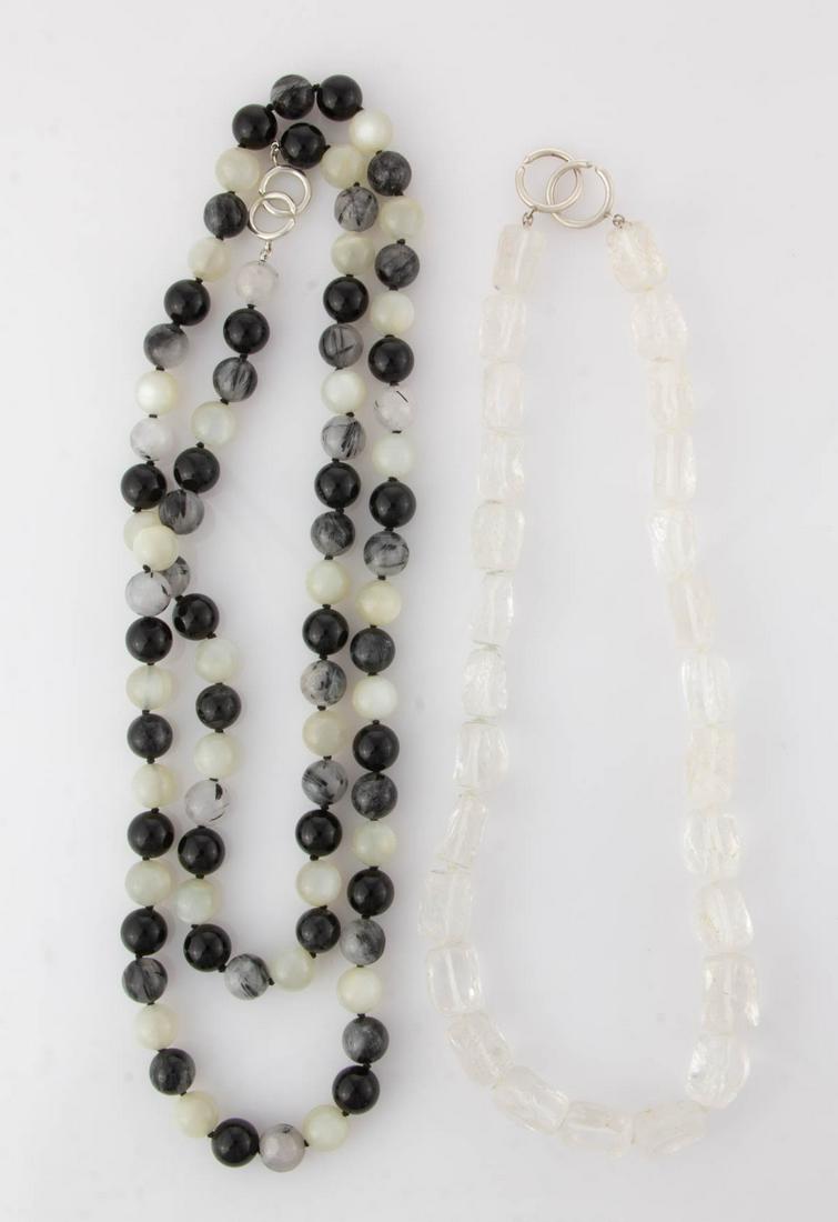 PALOMA PICASSO FOR TIFFANY & CO. STONE-BEADED: PALOMA PICASSO FOR TIFFANY & CO. STONE-BEADED NECKLACES, LOT OF TWO, comprising a princess-length example with quartz/rock crystal-type stone beads, and an opera-length example with alternating round 