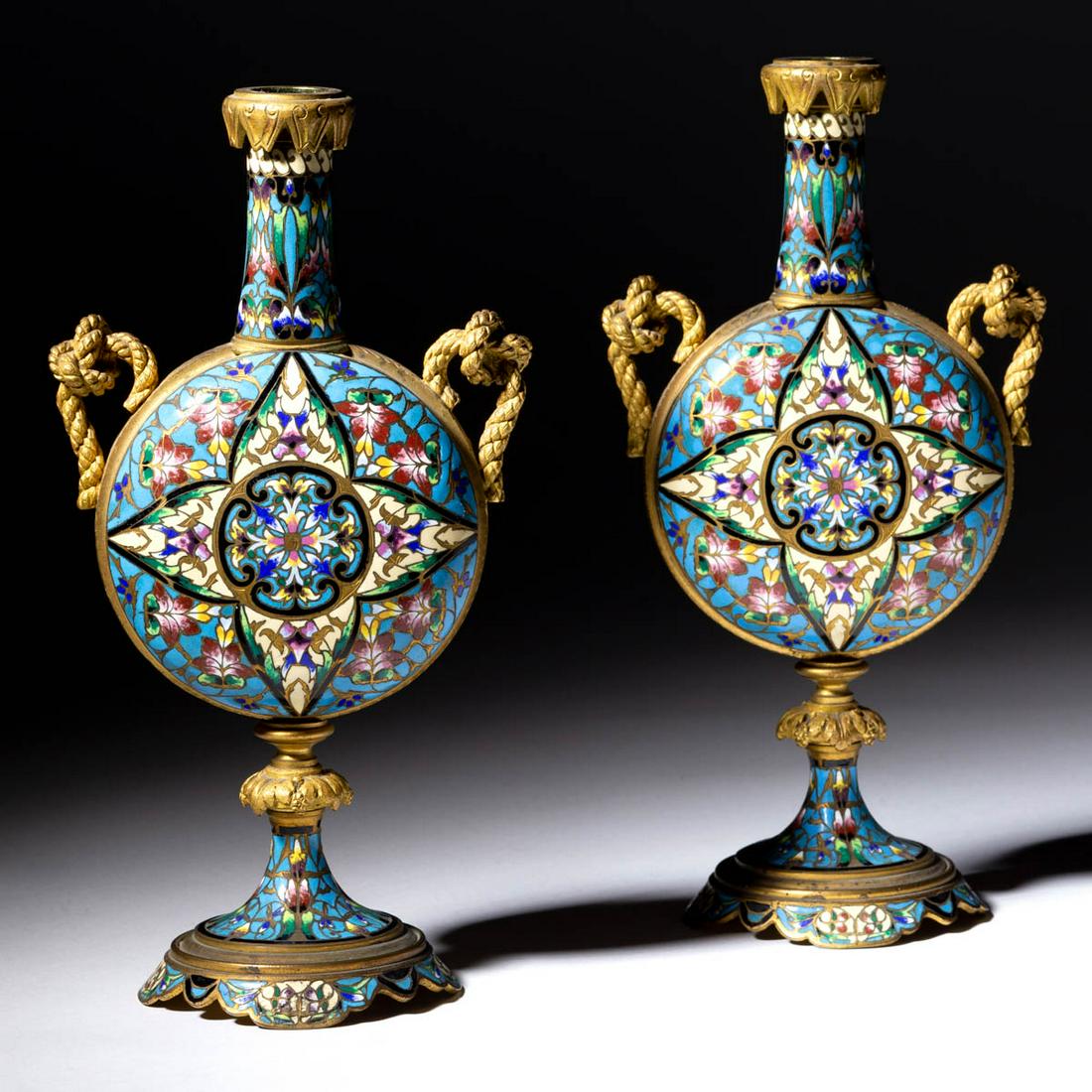 PAIR OF FRENCH CHAMPLEVE AND DORE BRONZE MOON FLASK: PAIR OF FRENCH CHAMPLEVE AND DORE BRONZE MOON FLASK VASES, in the Chinese taste, featuring spherical body, waisted neck and a small mouth, gilt-brass handles in the form of a knotted rope, floral desi