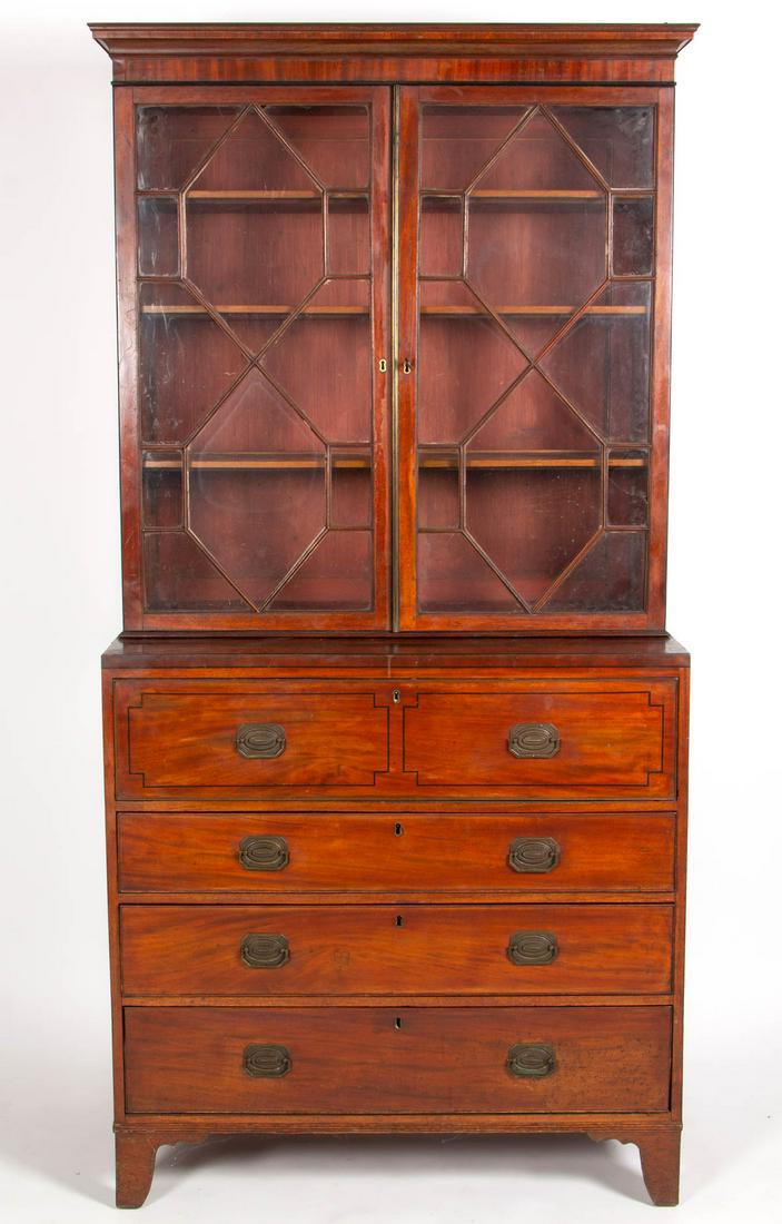 GEORGIAN INLAID MAHOGANY SECRETARY DESK AND BOOKCASE: GEORGIAN INLAID MAHOGANY SECRETARY DESK AND BOOKCASE, two-piece construction, applied cornice and two hinged bookcase doors exhibiting geometric fenestration in the Chinese style, three adjustable she