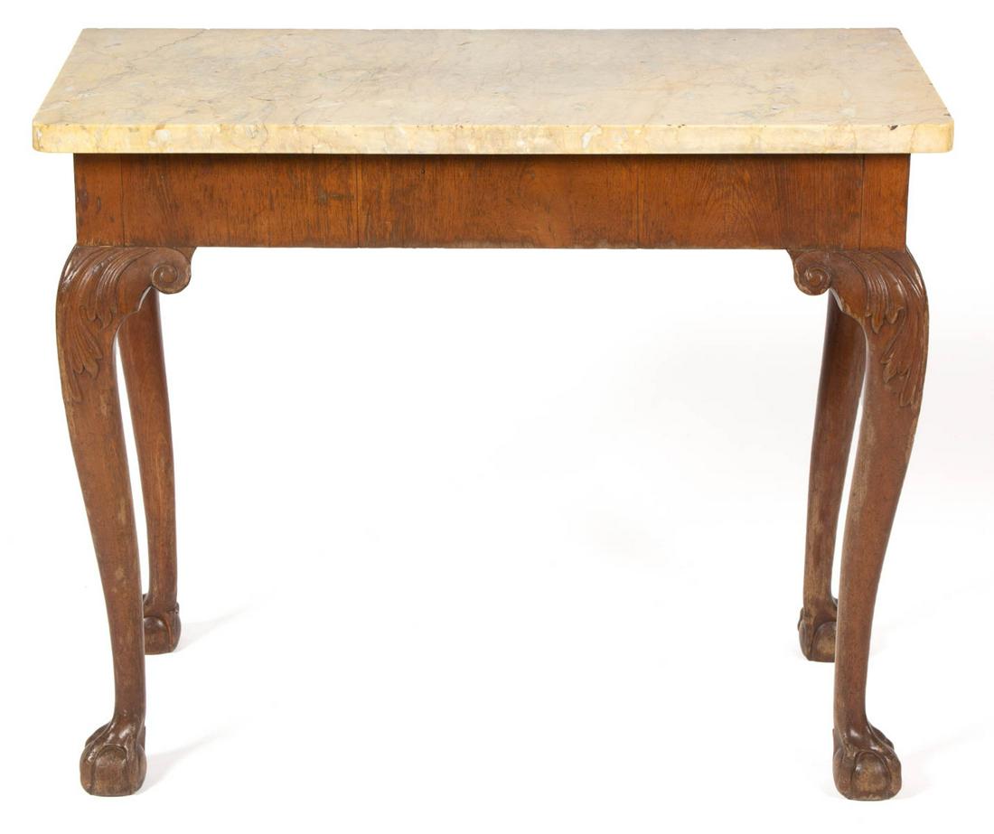 BRITISH MARBLE-TOP SERVING TABLE: BRITISH MARBLE-TOP SERVING TABLE, in the Chippendale-style, featuring cabriole legs terminating in carved ball-and-claw feet. Old surface with warm color. 19th century. 27 3/4" H, 34 1/4" W, 16 1/2" D