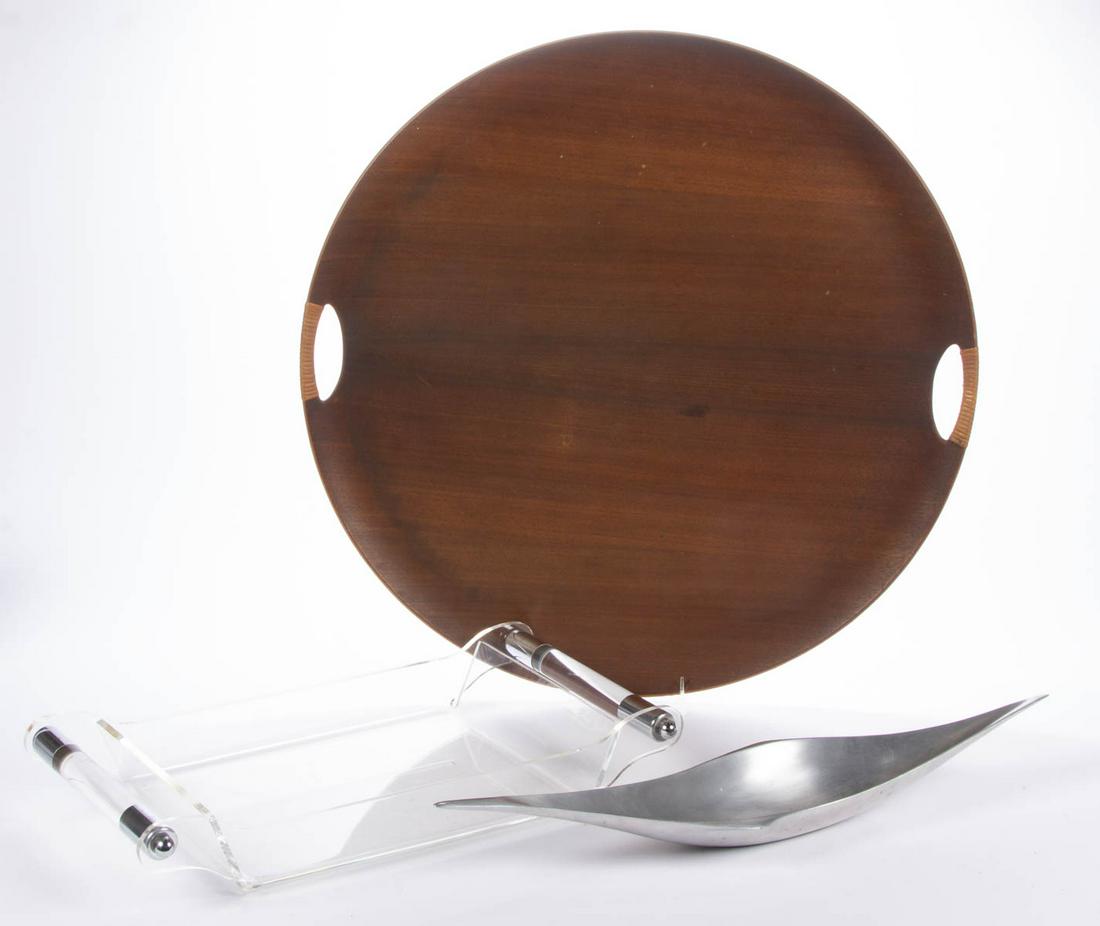 ASSORTED MID-CENTURY MODERN DOMESTIC ARTICLES, LOT OF: ASSORTED MID-CENTURY MODERN DOMESTIC ARTICLES, LOT OF THREE, comprising chrome and Lucite tray, aluminum tray by "Richard Benn Designs / Philadelphia, Pa.", and Fritz Hansen teakwood tray possibly fro