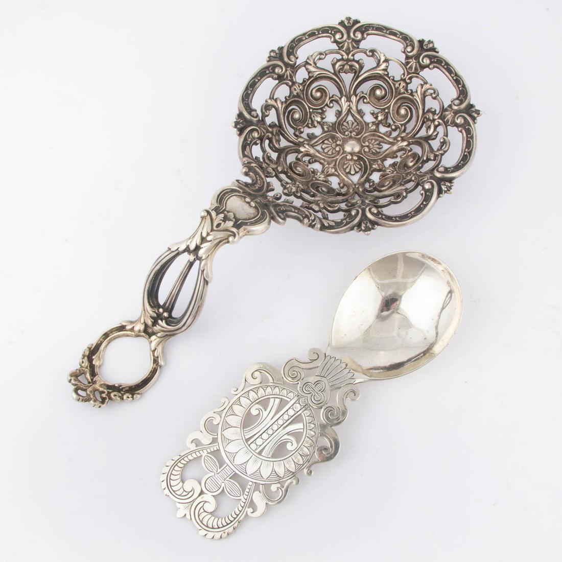 GORHAM AND GEORGE SHIEBLER RETICULATED STERLING SILVER: GORHAM AND GEORGE SHIEBLER RETICULATED STERLING SILVER ARTICLES, LOT OF TWO, comprising a reticulated bonbonniere server by Gorham Mfg. Co. with scrolled and shell motifs having long curved handle, an
