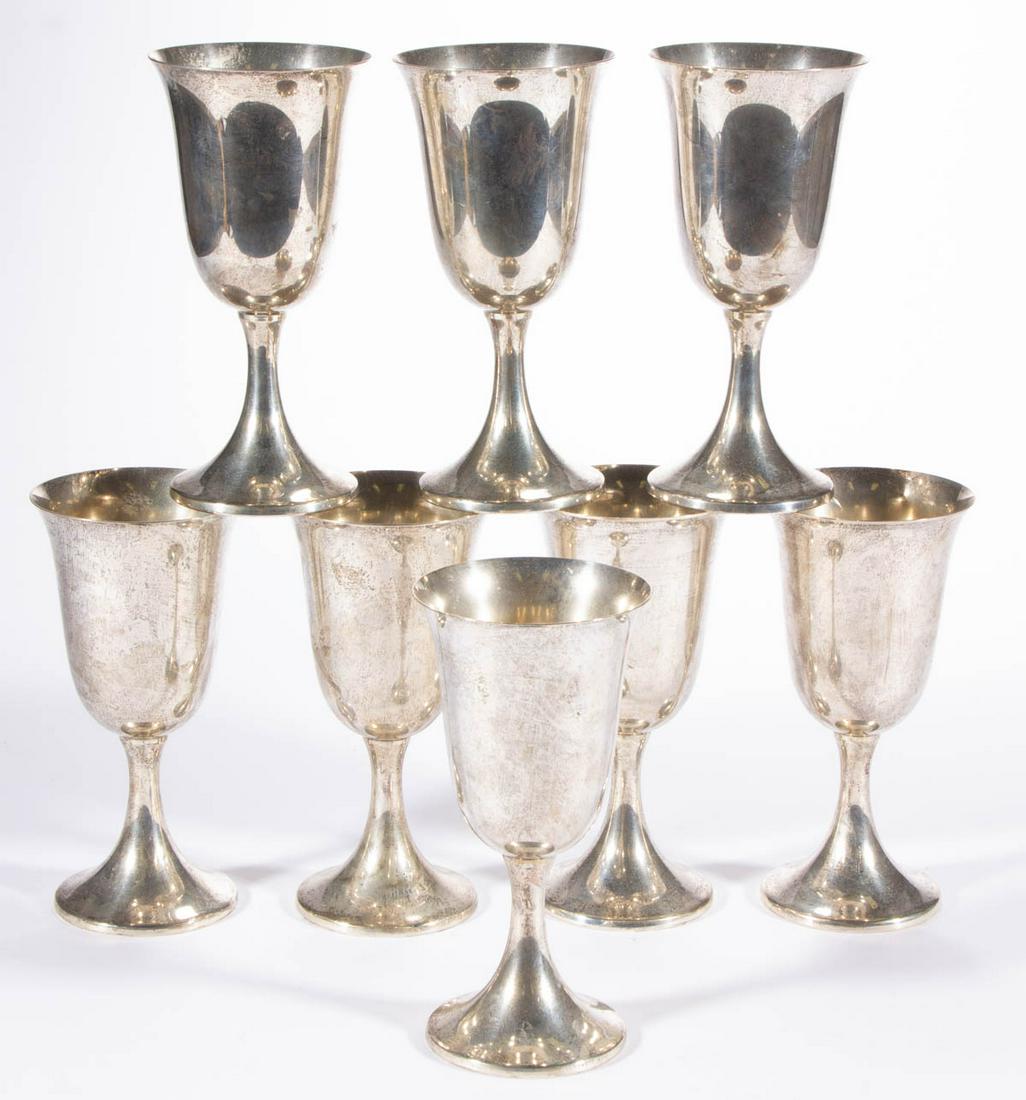 PREISNER STERLING SILVER GOBLETS, SET OF EIGHT: PREISNER STERLING SILVER GOBLETS, SET OF EIGHT, each having a semi-ovoid bowl with flared rim, raised on a stemmed round foot. Each marked "Preisner / STERLING / 4" to base. Total weight: 33.42 ozt. P