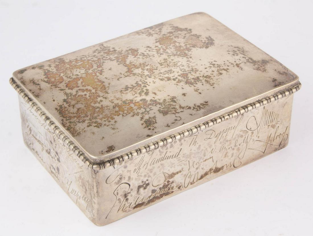 DANISH 0.826 SILVER BOX: DANISH 0.826 SILVER BOX, rectangular form having hammered texture, topped by a hinged lid with bead-and-reel edge, three exterior sides featuring various engraved signatures. Impressed to base and int