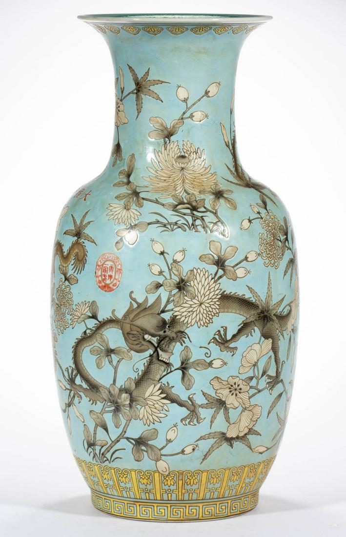 CHINESE EXPORT PORCELAIN QING-STYLE FAMILLE ROSE VASE: CHINESE EXPORT PORCELAIN QING-STYLE FAMILLE ROSE VASE, baluster form, featuring dragons swirling amongst various flowers on light turquoise ground. Having red four-character mark to underside. Probabl