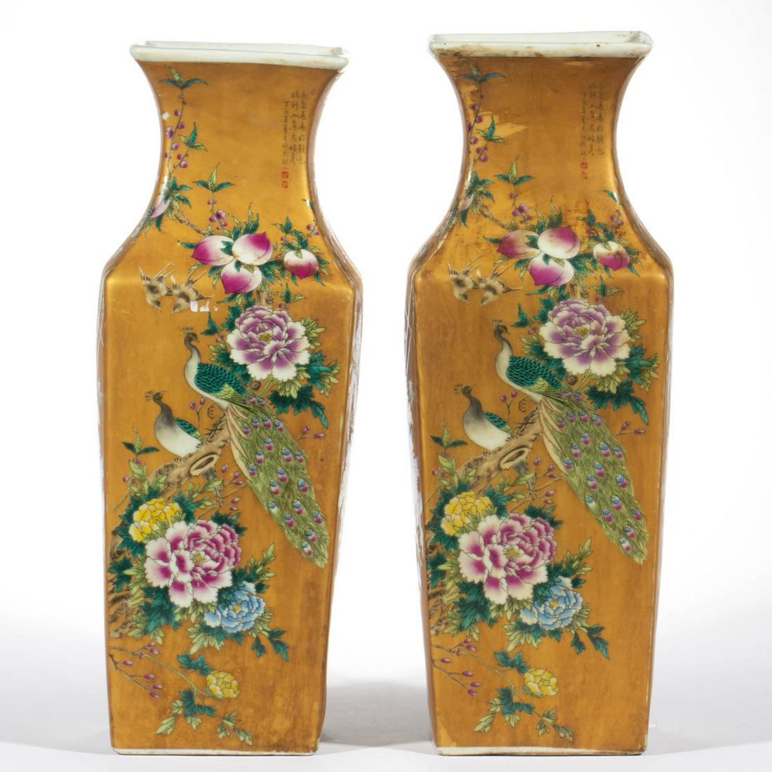 CHINESE EXPORT PORCELAIN FAMILLE ROSE PAIR OF VASES: CHINESE EXPORT PORCELAIN FAMILLE ROSE PAIR OF VASES, square form featuring polychrome floral designs with a variety of birds including peacocks and cranes on orange ground. Each having black four-char