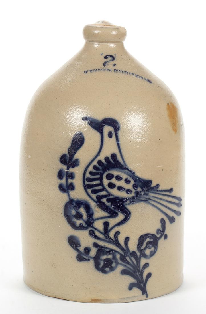 STAMPED "W. ROBERTS. BINGHAMTON. NY", NEW YORK: STAMPED "W. ROBERTS. BINGHAMTON. NY", NEW YORK DECORATED STONEWARE JUG, salt-glazed, "2" gallon capacity mark, beehive form with flat-top, rounded mouth and strap handle, Albany-slip glazed interior.