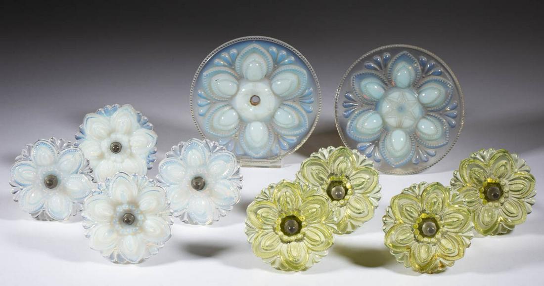 PRESSED ROSETTE CURTAIN PINS / TIE BACKS, LOT OF TEN: PRESSED ROSETTE CURTAIN PINS / TIE BACKS, LOT OF TEN, comprising two large fiery opalescent circular examples, four opalescent small-size, and four canary yellow (reacts under black light) examples, n