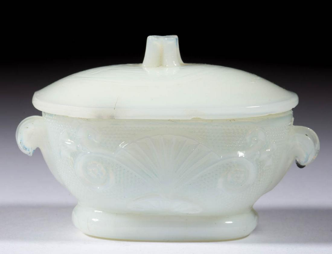 PRESSED LACY SMALL TOY COVERED TUREEN: PRESSED LACY SMALL TOY COVERED TUREEN, deep fiery opalescent, various fan, lily, scroll, star, and diamond design elements, tureen with molded handles. Boston & Sandwich Glass Co. 1835-1850. 2 1/8" HO