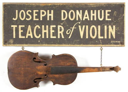 AMERICAN FOLK ART PAINTED WOODEN MUSIC TEACHER'S TRADE: AMERICAN FOLK ART PAINTED WOODEN MUSIC TEACHER'S TRADE SIGN, period violin suspended from a rectangular single-sided lettered sign with "JOSEPH DONAHUE / TEACHER of VIOLIN" in stenciled white letters