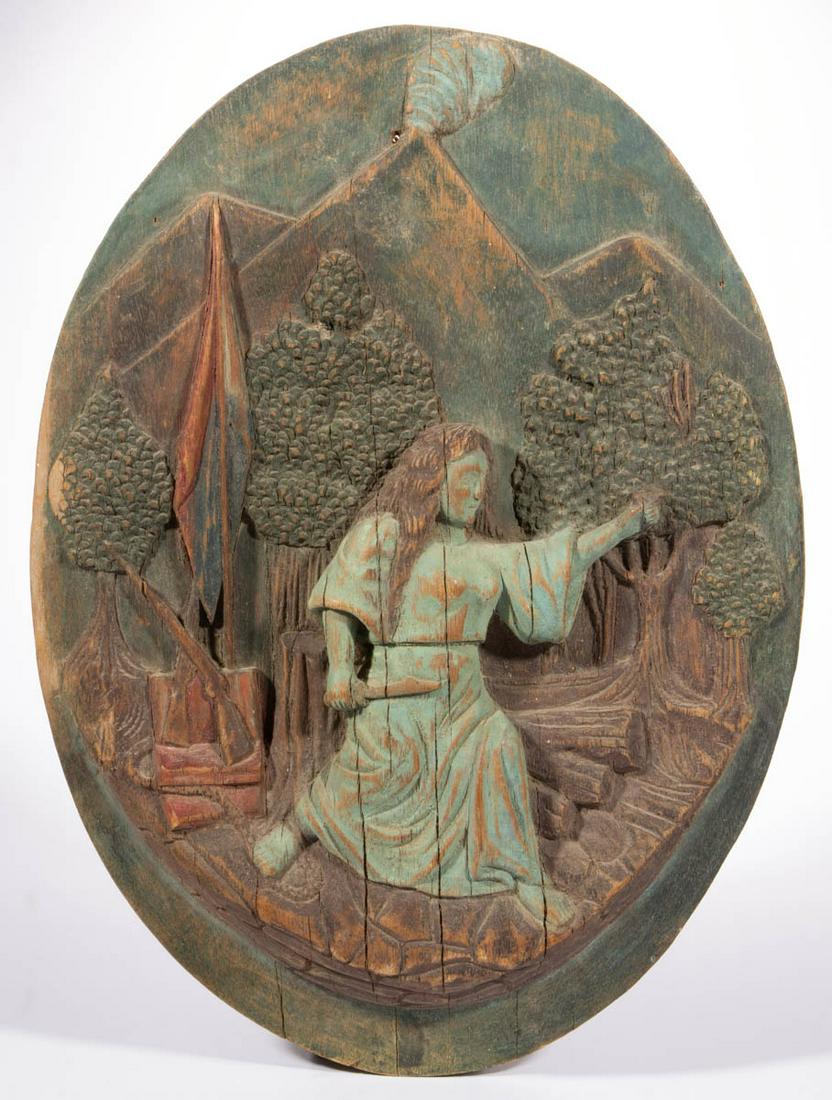 AMERICAN, POSSIBLY SOUTHERN, FOLK ART CARVED AND: AMERICAN, POSSIBLY SOUTHERN, FOLK ART CARVED AND PAINTED HARDWOOD PLAQUE, possibly butternut walnut, oval form with high relief carving of a robed woman with long hair holding a knife in one hand, the