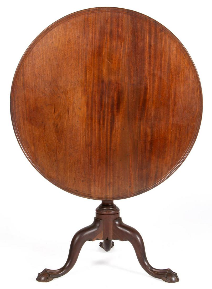 CHESTER CO., PENNSYLVANIA CHIPPENDALE MAHOGANY TILT-TOP: CHESTER CO., PENNSYLVANIA CHIPPENDALE MAHOGANY TILT-TOP TEA TABLE, the circular two-board dished top over birdcage above baluster pedestal raised on tripodal base with cabriole legs ending in ball-and