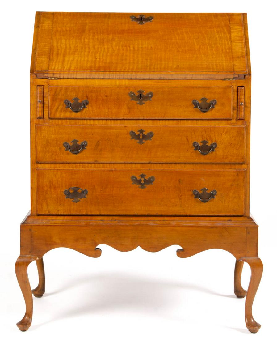 BENCH-MADE QUEEN ANNE-STYLE TIGER MAPLE LADY'S DESK: BENCH-MADE QUEEN ANNE-STYLE TIGER MAPLE LADY'S DESK, two-piece construction, dovetailed case with hinged fall-board concealing a fitted interior, above three drawers, base with "Bandy" legs. Pine and 