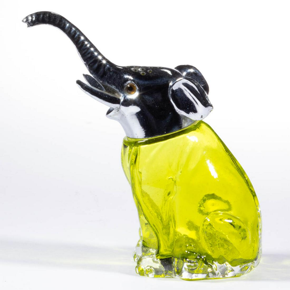 ELEPHANT FIGURAL SUGAR SHAKER: ELEPHANT FIGURAL SUGAR SHAKER, cased green, with factory polished base. Attributed to S.W. Farber, Inc. Second quarter 20th century. 5 7/8" HOA. Undamaged. Literature: Parallels Lechner - The World of