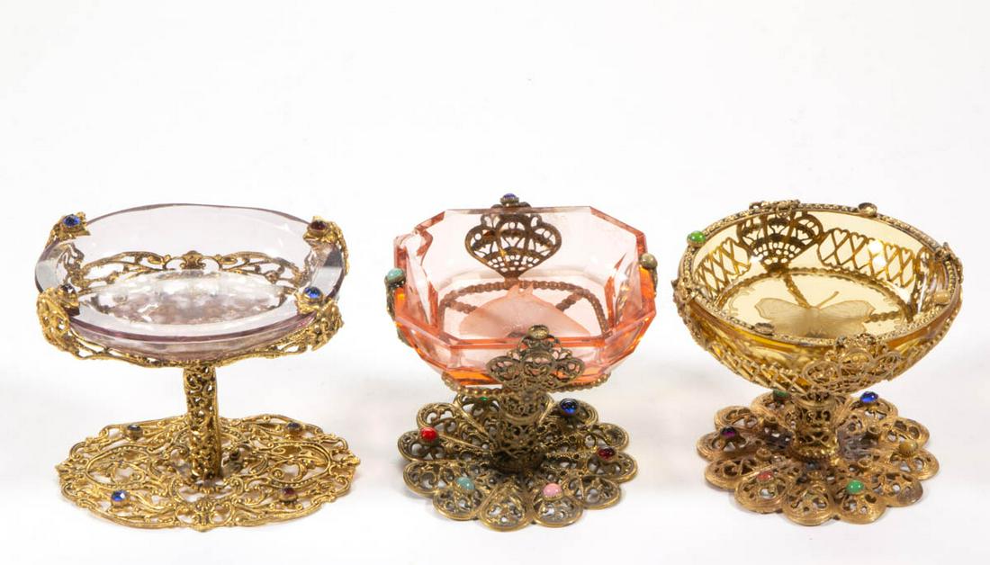 INTAGLIO GLASS OPEN SALTS IN STANDS, LOT OF THREE: INTAGLIO GLASS OPEN SALTS IN STANDS, LOT OF THREE, amber, bright rose, and pale amethyst, amber having a butterfly, rose depicting a horse, and the amethyst featuring a blooming branch, each raised on