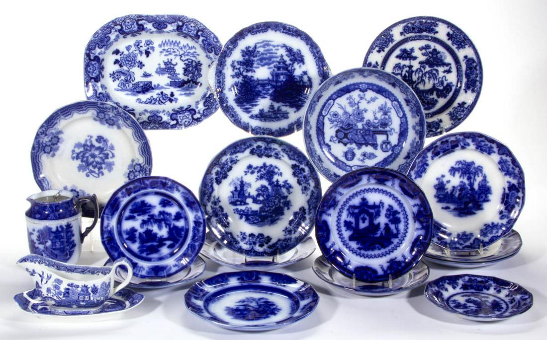 ENGLISH STAFFORDSHIRE FLOW BLUE TRANSFER-PRINTED: ENGLISH STAFFORDSHIRE FLOW BLUE TRANSFER-PRINTED CHINOISERIE MOTIF CERAMIC TABLE ARTICLES, LOT OF 19, including a 10 3/8" D cake plate with "GEISHA" pattern, a sauce boat with undertray having Blue Wi