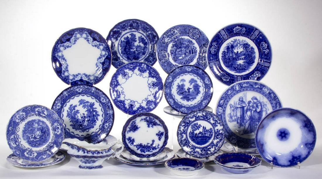 ASSORTED FLOW BLUE TRANSFER-PRINTED CERAMIC TABLE: ASSORTED FLOW BLUE TRANSFER-PRINTED CERAMIC TABLE ARTICLES, LOT OF 27, including an 8 1/4" D bowl with Persian Moss pattern, a sauce boat, two 6 1/2" D, and one 8 3/4" D plates with "TOURAINE" design,