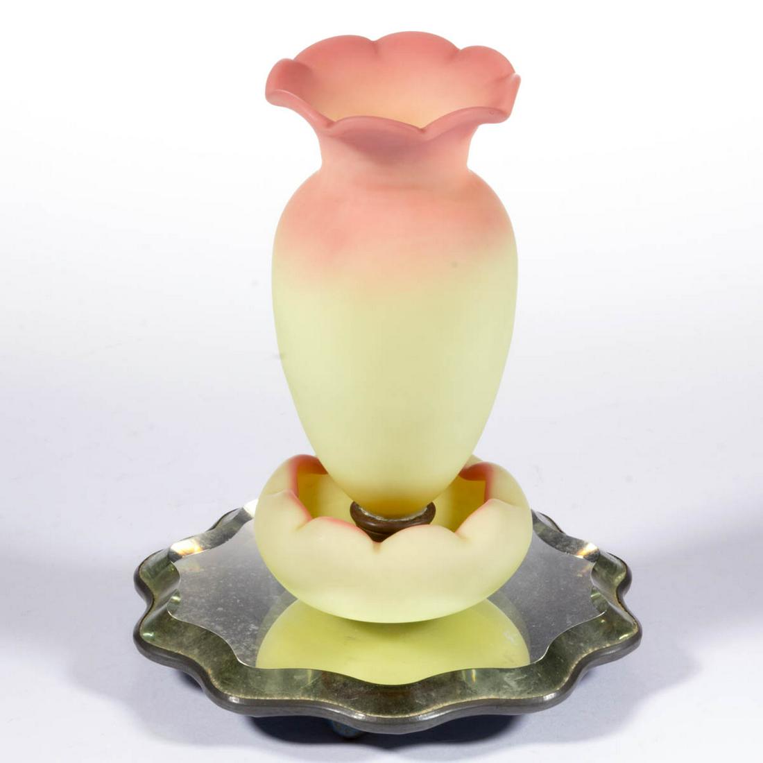 WEBB BURMESE ATTRIBUTED GLASS EPERGNE: WEBB BURMESE ATTRIBUTED GLASS EPERGNE, plush, having a central ovoid vase with a tooled rim with a lower Burmese bowl, all supported by a glass and metal base with a concave edge. Thomas Webb & Sons.