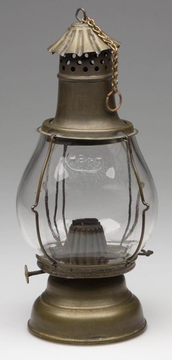 HOLMES, BOOTH & HAYDENS BRASS LANTERN: HOLMES, BOOTH & HAYDENS BRASS LANTERN, colorless globe, embossed "H B & H" within an oval, chimneyless burner with thumbwheel stamped "HOLMES BOOTH & HAYDENS WATERBURY CT", non-period chain. 9 5/8" h 