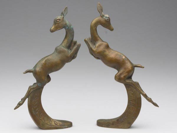 ART DECO BRONZE GAZELLES, PAIR: ART DECO BRONZE GAZELLES, PAIR, being mirror images, one marked with an incised intertwined "BB" on back edge of mount, each with threaded hole in base, lacking horns. First half 20th century. 9" h ov
