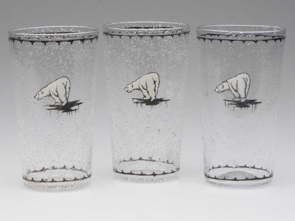 PAIRPOINT TAVERN GLASS / SEEDED WARE TUMBLERS, SET: PAIRPOINT TAVERN GLASS / SEEDED WARE TUMBLERS, SET OF THREE, colorless, with black and white polar bear decoration, and polished pontil mark, two with decorator's mark "D1516 / 284", designation for t