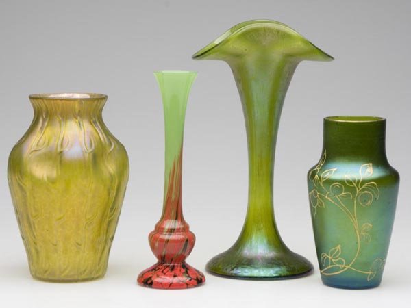 ART GLASS VASES, LOT OF FOUR: ART GLASS VASES, LOT OF FOUR, green with various surface decorations, including Loetz' Neptune pattern and a furnace-decorated Czechoslovakian example, together with two others. 20th century. 7 1/2" t