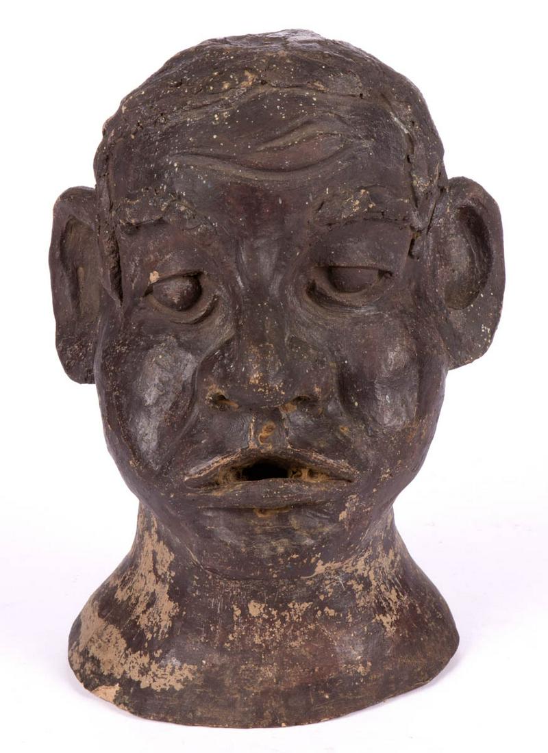 AMERICAN FOLK ART EARTHENWARE / TERRACOTTA AFRICAN: AMERICAN FOLK ART EARTHENWARE / TERRACOTTA AFRICAN AMERICAN BUST, hand-formed hollow form, depicting a male with pronounced facial features and applied hair and eyebrows, open mouth. Original dark bro
