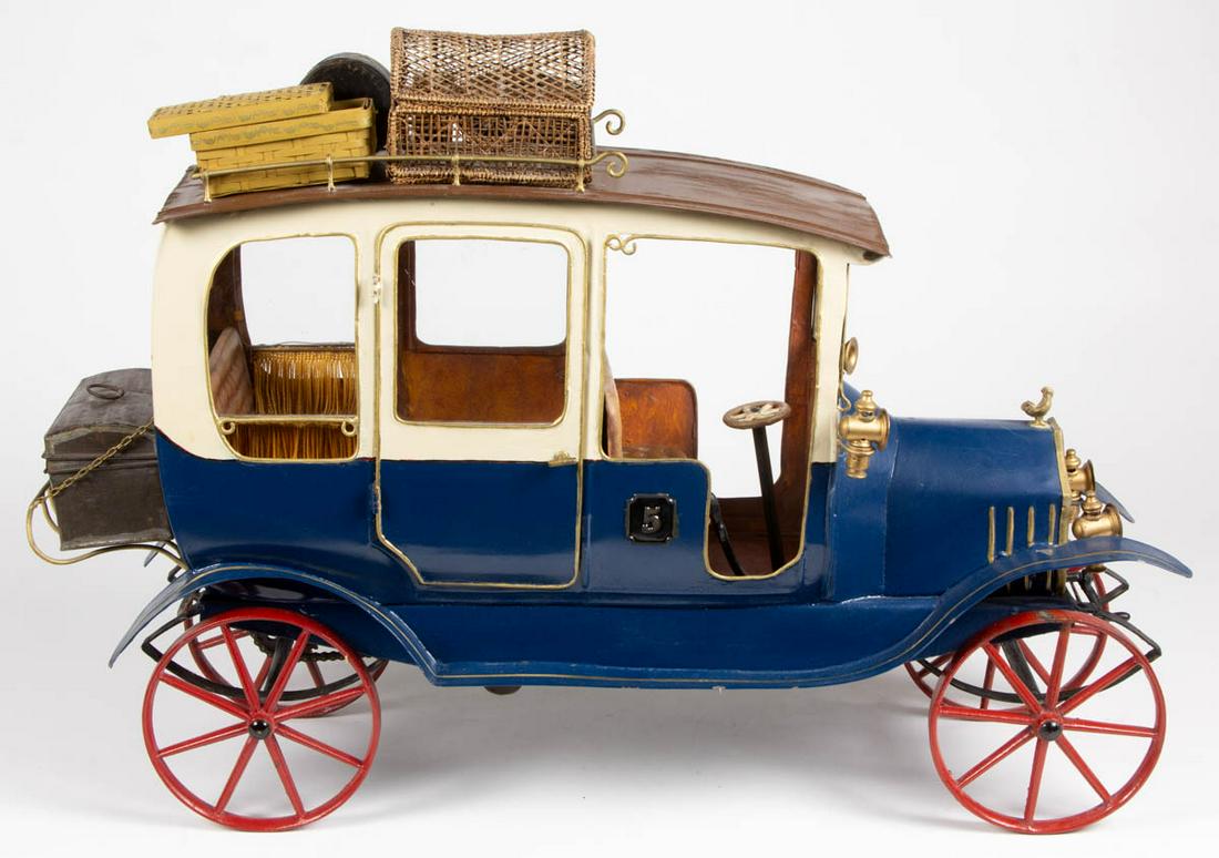 FOLK ART PAINTED SHEET-METAL WIND-UP MODEL T TOURING: FOLK ART PAINTED SHEET-METAL WIND-UP MODEL T TOURING CAR, fine detail, with "E.C. Spurin's / Manufactory and Repository / New Bond Street / London." tags on front and back, "Patent" plaque applied to