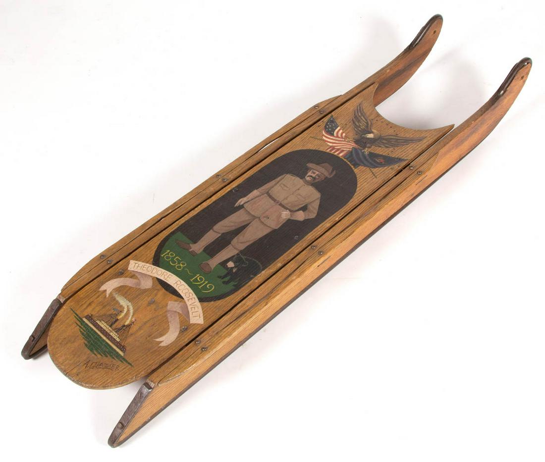 ARTHUR E. GLAZIER (PENNSYLVANIA, 1928-2015) PATRIOTIC: ARTHUR E. GLAZIER (PENNSYLVANIA, 1928-2015) PATRIOTIC PAINT-DECORATED FOLK ART CHILD'S SLED, modern decoration on a late 19th/early 20th century oak sled with iron runners, featuring a full-length por