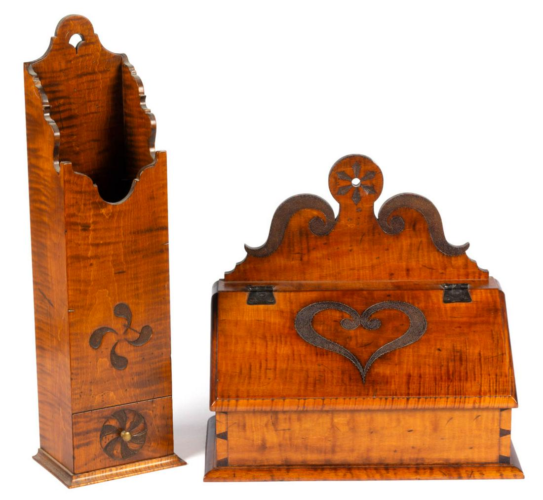 GEORGE BESHORE (PENNSYLVANIA, 1923-2009) BENCHMADE: GEORGE BESHORE (PENNSYLVANIA, 1923-2009) BENCHMADE TIGER MAPLE WALL BOXES, LOT OF TWO, comprising a pipe box form with scalloped profile and fylfot decoration, and a candlebox form with heart decorati