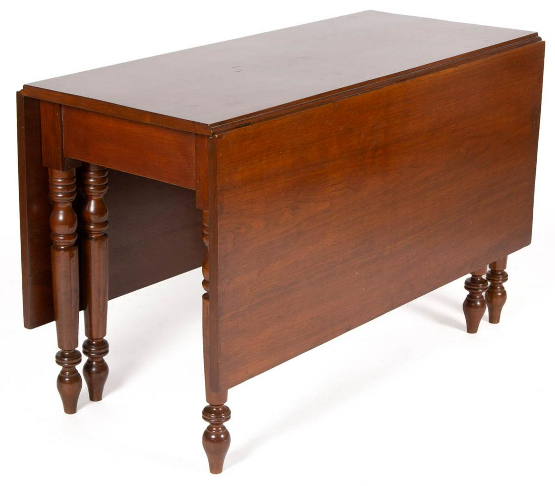 SHENANDOAH VALLEY OF VIRGINIA FALL-LEAF DINING TABLE: SHENANDOAH VALLEY OF VIRGINIA FALL-LEAF DINING TABLE, rectangular top with two hinged fall leaves, raised on six turned legs terminating in spade feet. Old refinished surface with warm color. 19th cen