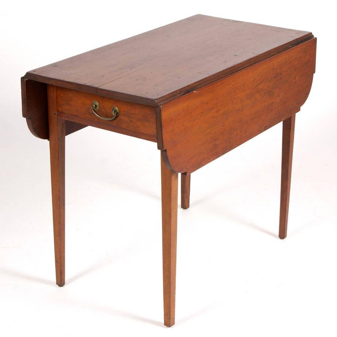 AMERICAN PINE BREAKFAST / PEMBROKE TABLE: AMERICAN PINE BREAKFAST / PEMBROKE TABLE, featuring two hinged fall leaves, raised on square tapered legs. Old refinished surface with warm color. 19th century. 27 1/4" H, 35" x 19" top (closed). Prov
