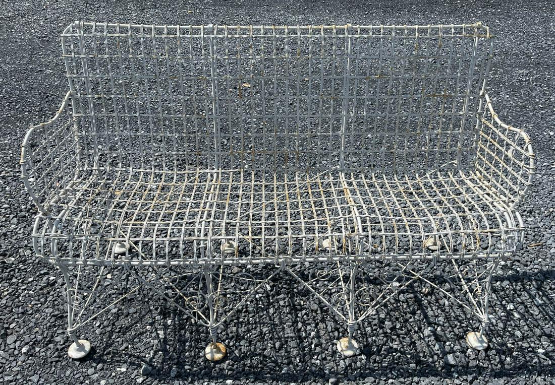 VICTORIAN PAINTED METAL WIRE GARDEN BENCH: VICTORIAN PAINTED METAL WIRE GARDEN BENCH, open-work back and seat with scrolled elements to base, retaining an old white-painted surface. Late 19th/first quarter 20th century. 33 1/4" HOA, 19" H seat