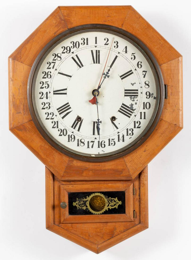 NEW HAVEN CLOCK CO., CONNECTICUT WALL CLOCK: NEW HAVEN CLOCK CO., CONNECTICUT WALL CLOCK, eight-day movement, featuring octagonal form, featuring painted sheet metal dial with Roman numerals, pendulum present. Old surface with mild color. 20th c