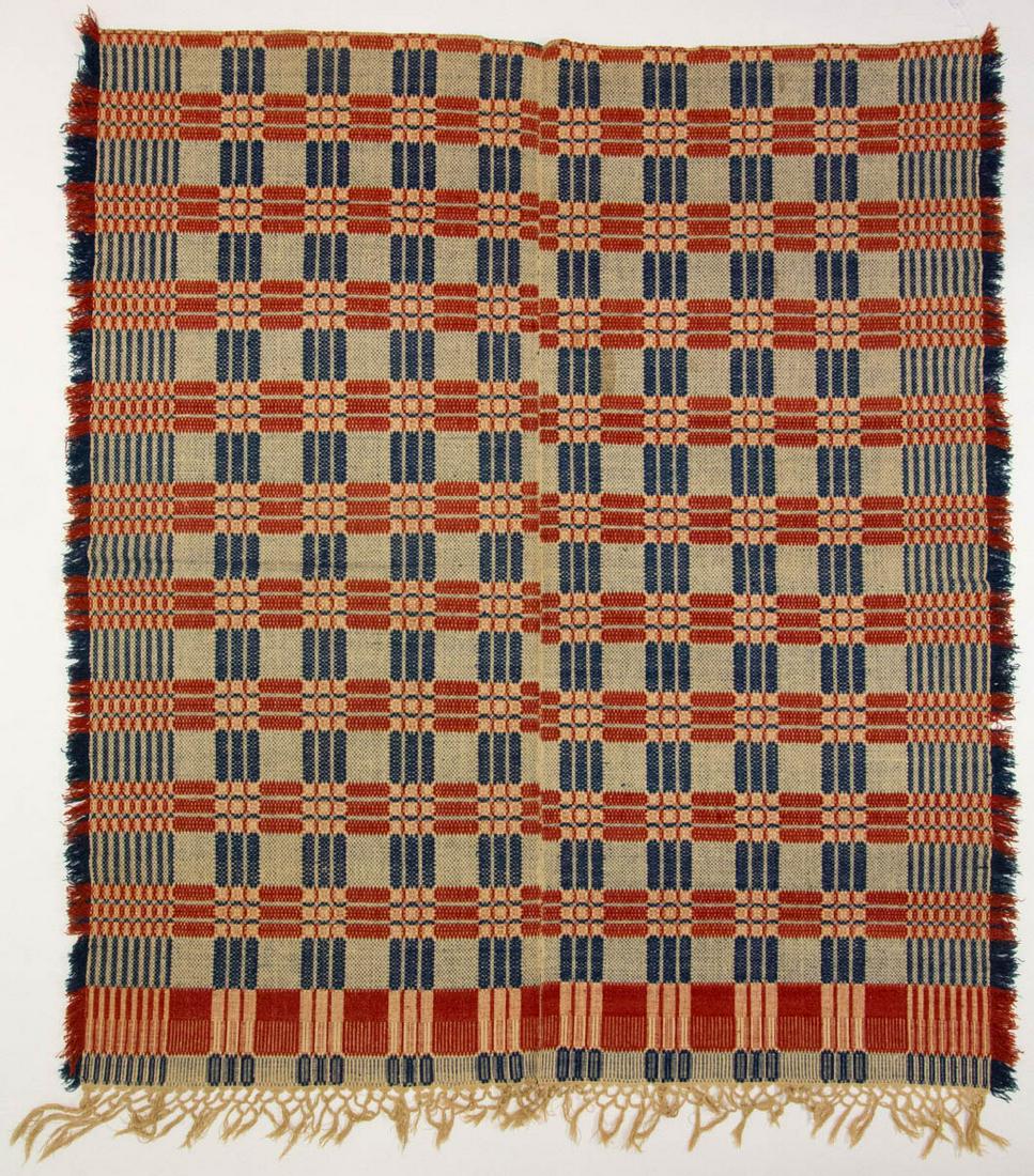 MID-ATLANTIC OVERSHOT COVERLET: MID-ATLANTIC OVERSHOT COVERLET, blue and rust red wool, and natural cotton, two joined panels, overall grid and block pattern, three sides with border and fringe. Second half 19th century. 72" x 85 1/