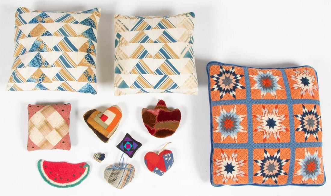 QUILT FRAGMENT AND OTHER PILLOWS AND RELATED ARTICLES,: QUILT FRAGMENT AND OTHER PILLOWS AND RELATED ARTICLES, LOT OF 11, comprising a set of two pillows having pieced quilt fragments with blue and tan print and white solid fabrics, a needlepoint-front pil