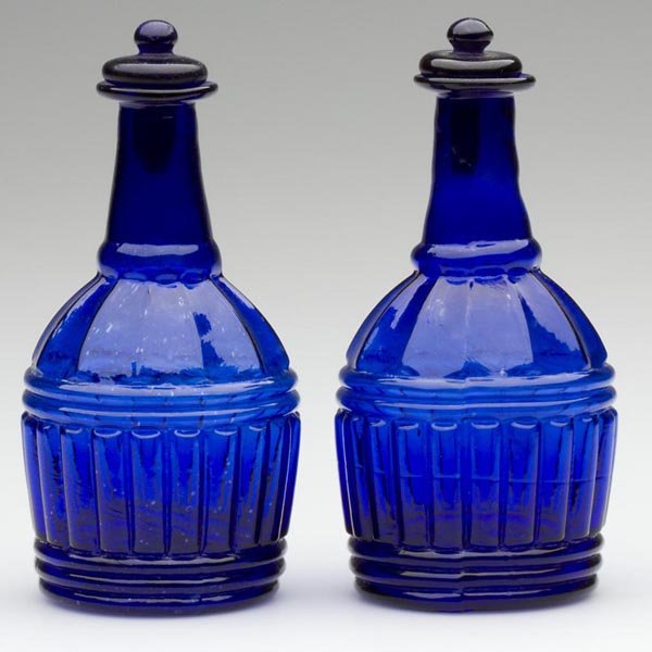 FINE PAIR OF BLOWN-MOLDED GI-29 HALF-PINT DECANTER: FINE PAIR OF BLOWN-MOLDED GI-29 HALF-PINT DECANTERS OR CRUETS, brilliant deep sapphire blue, one with a folded lip and the other with a plain lip, each with a molded neck ring, ringed base with a roug