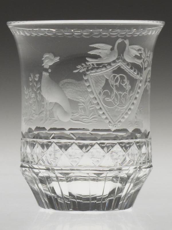 FREE-BLOWN, CUT AND ENGRAVED TUMBLER: FREE-BLOWN, CUT AND ENGRAVED TUMBLER, colorless, beaker form featuring a delicate decoration including a greyhound, sheep, love birds, and a shield containing the initials "SL", cut diamonds and flute