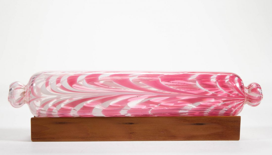 FREE-BLOWN MARBRIE-LOOP DECORATED ROLLING PIN: FREE-BLOWN MARBRIE-LOOP DECORATED ROLLING PIN, colorless with four groups of rose over opal loopings, two pinched knob handles, with each side having a rough pontil opening. United States or Europe. 1