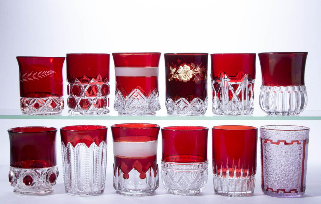ASSORTED EAPG - RUBY-STAINED TUMBLERS, LOT OF 12: ASSORTED EAPG - RUBY-STAINED TUMBLERS, LOT OF 12, colorless, two with frosted bands, and a few with gilt remnants, including a New Martinsville No. 722 / Lorraine, a Hero / Ruby Rosette with amber-sta