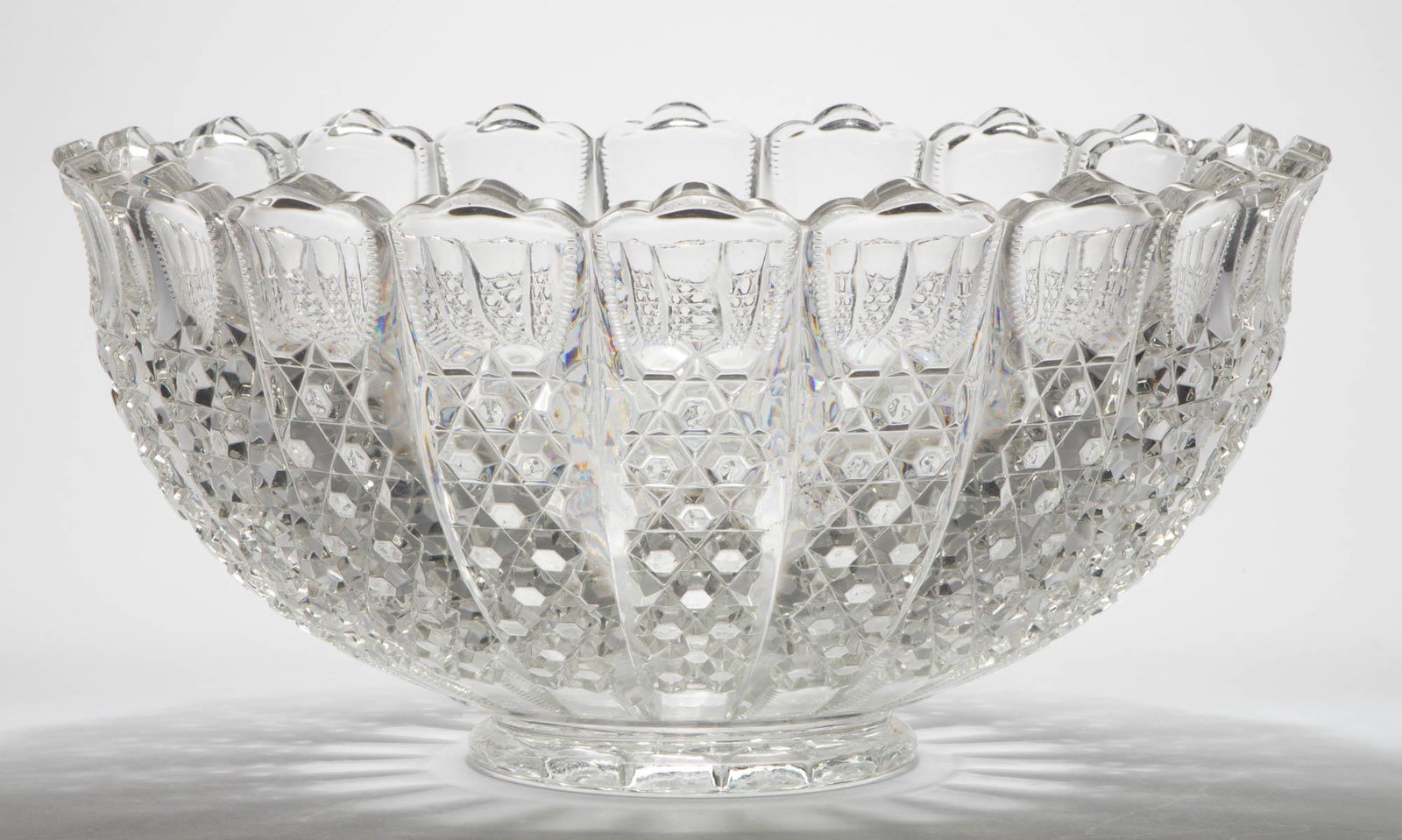 DUNCAN NO. 44 / BUTTON PANEL PUNCH BOWL: DUNCAN NO. 44 / BUTTON PANEL PUNCH BOWL, colorless. George Duncan's Sons & Co. Circa 1900. 7" H, 14" D. Provenance: From the John & late Evelyn Teague collection, Bloomingdale, IN.