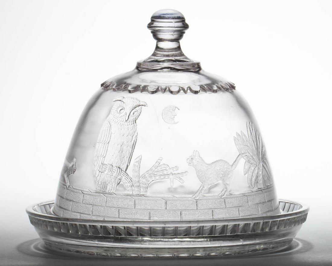 OWL AND PUSSYCAT CHEESE DISH: OWL AND PUSSYCAT CHEESE DISH, colorless and frosted. Late 19th/early 20th century. 6 1/2" HOA, 8" D. Provenance: From the Briggs - Richardson Collection, Stephens City, VA.