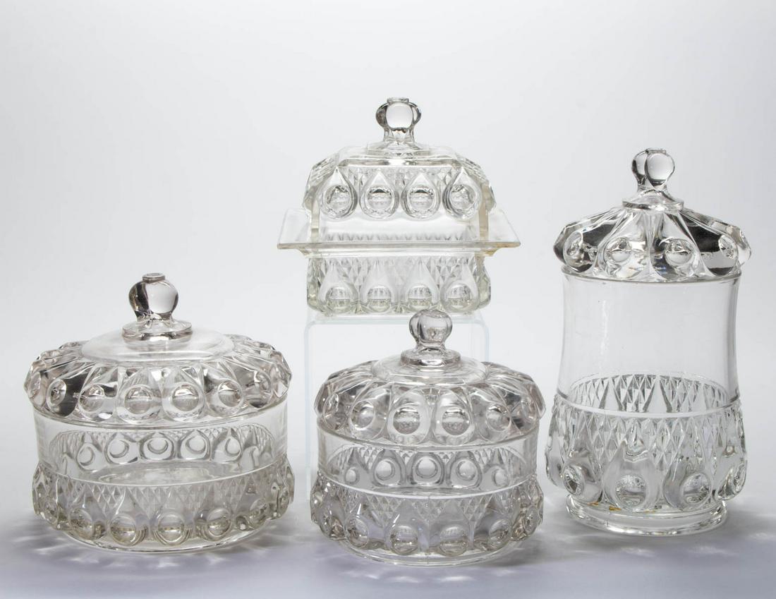 REVERSE TORPEDO TABLE ARTICLES, LOT OF FOUR: REVERSE TORPEDO TABLE ARTICLES, LOT OF FOUR, colorless, comprising a covered honey dish, covered cracker jar, and two covered bowls. Dalzell, Gilmore & Leighton Co., Findlay, OH. Circa 1892. 6" to 9 7