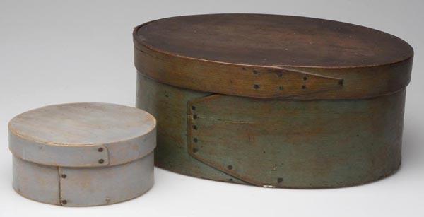 TWO AMERICAN PAINTED WOOD PANTRY BOXES: TWO AMERICAN PAINTED WOOD PANTRY BOXES, comprised of a round and an oval example, both with wooden pin and tacked construction and in original paint. Second half 19th and early 20th century. 2 3/4" h,