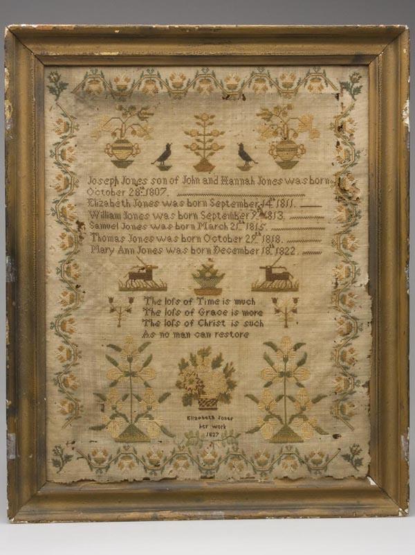 JONES FAMILY, 1827 FAMILY RECORD SAMPLER: JONES FAMILY, 1827 FAMILY RECORD SAMPLER, silk on linen, flower urns, birds and a tree above a record of John and Hannah Jones and their six children, two deer and a flower basket, a four-line verse,
