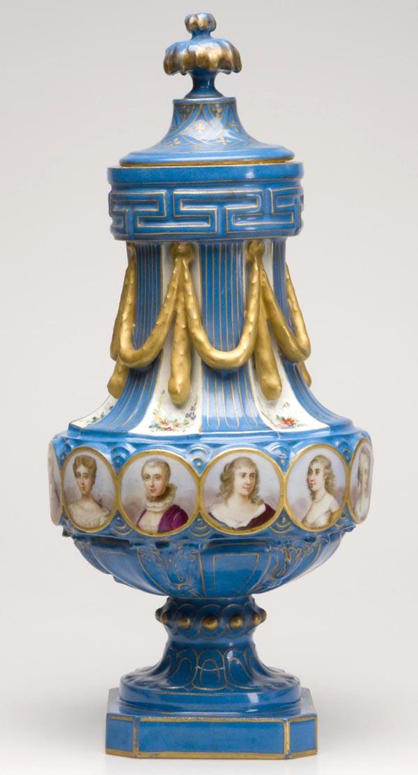 FRENCH SEVRES-STYLE PORCELAIN BOLTED AND COVERED U: FRENCH SEVRES-STYLE PORCELAIN BOLTED AND COVERED URN, decorated with 12 hand-painted portrait medallions, one bearing an artist's signature, blue under-glaze double-L mark with "S---" below, probably