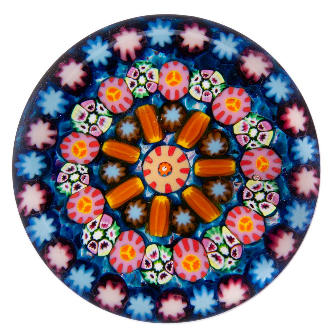 EARLY PAUL YSART (SCOTTISH, 1904-1979) ATTRIBUTED: EARLY PAUL YSART (SCOTTISH, 1904-1979) ATTRIBUTED CONCENTRIC MILLEFIORI ART GLASS PAPERWEIGHT, large central tan and red tube, encircled by three exterior garlands with the interior comprised of blue