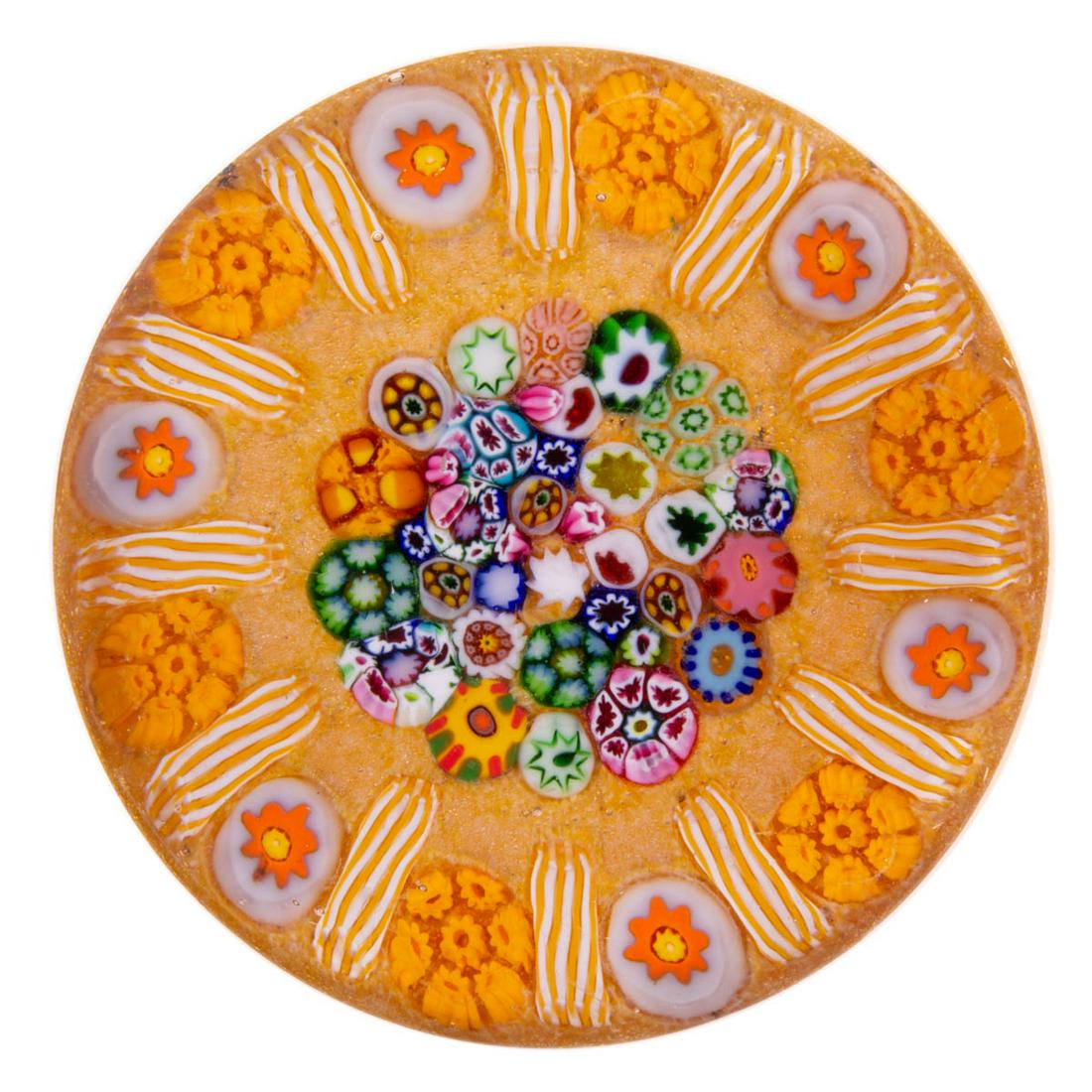 EARLY PAUL YSART (SCOTTISH, 1904-1979) ATTRIBUTED: EARLY PAUL YSART (SCOTTISH, 1904-1979) ATTRIBUTED MEDALLION MILLEFIORI ART GLASS PAPERWEIGHT, central close-pack millefiori medallion with a variety of multi-colored canes, encircled by an exterior ga