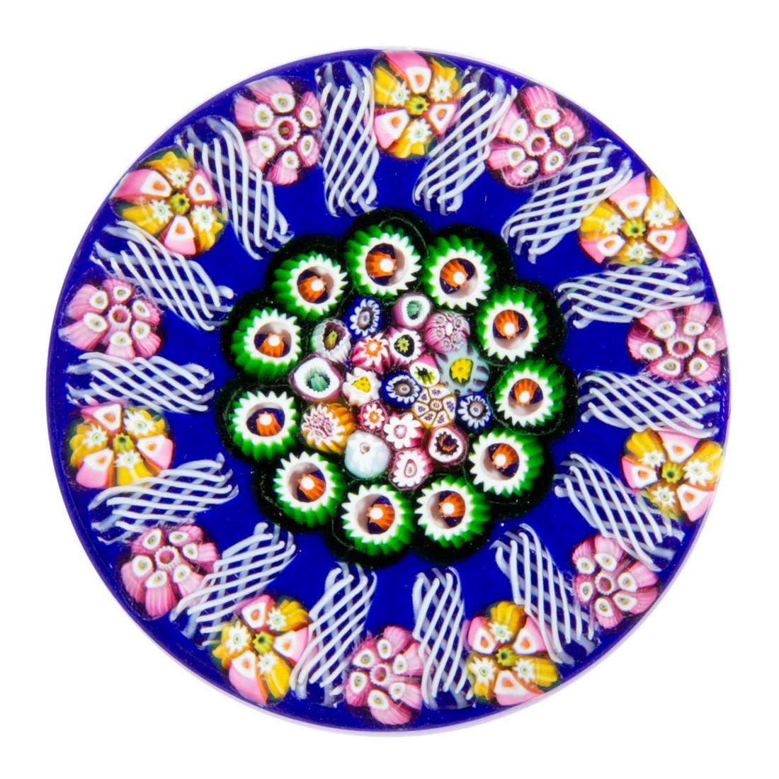 EARLY PAUL YSART (SCOTTISH, 1904-1979) CLOSE-PACK: EARLY PAUL YSART (SCOTTISH, 1904-1979) CLOSE-PACK MEDALLION MILLEFIORI ART GLASS PAPERWEIGHT, central close-pack medallion featuring a variety of multi-colored millefiori canes, encircled by an interi